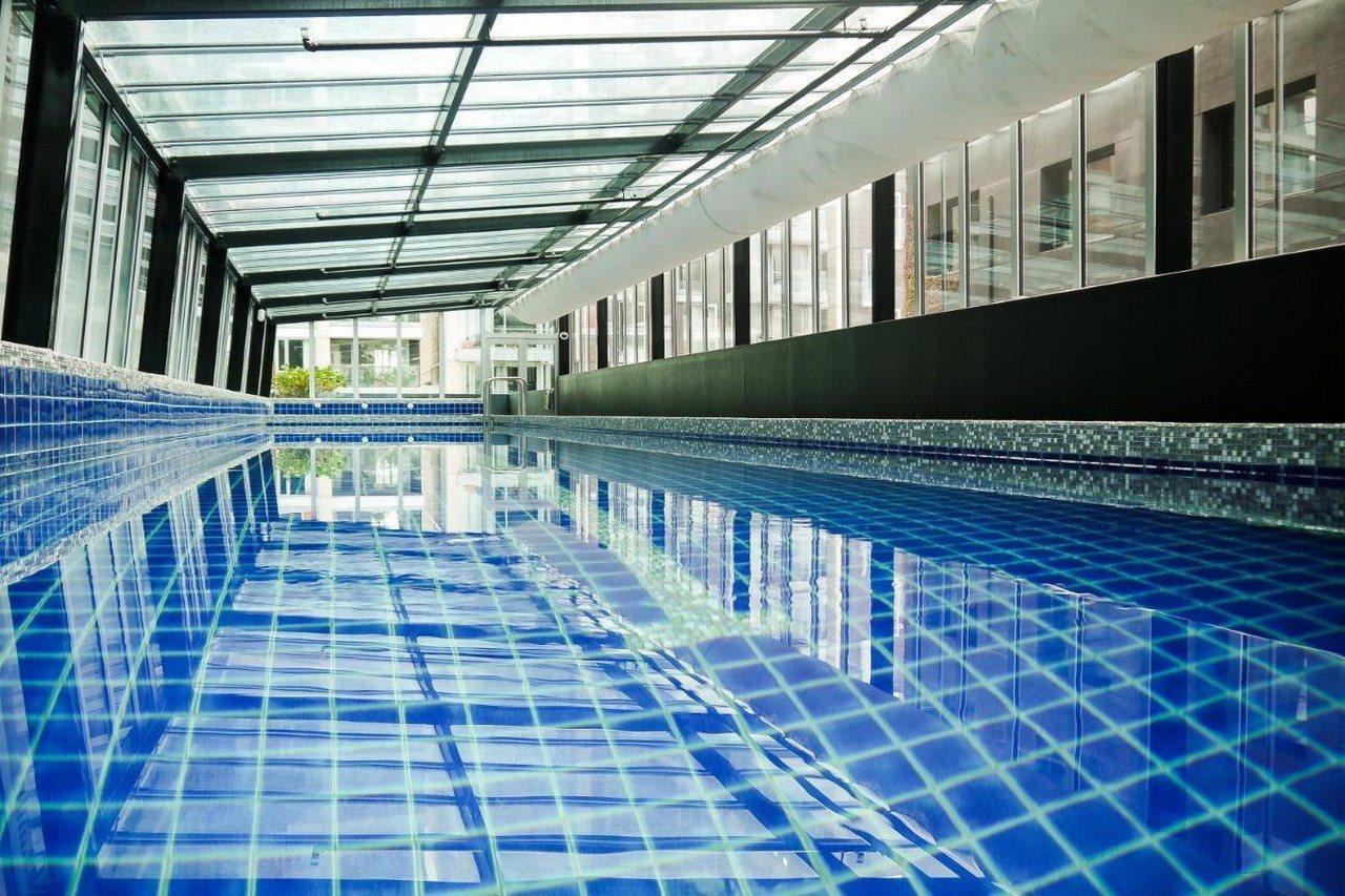 คิวที เวลลิงตัน อพาร์ตเมนต์ Hotel ภายนอก รูปภาพ The swimming pool at the hotel