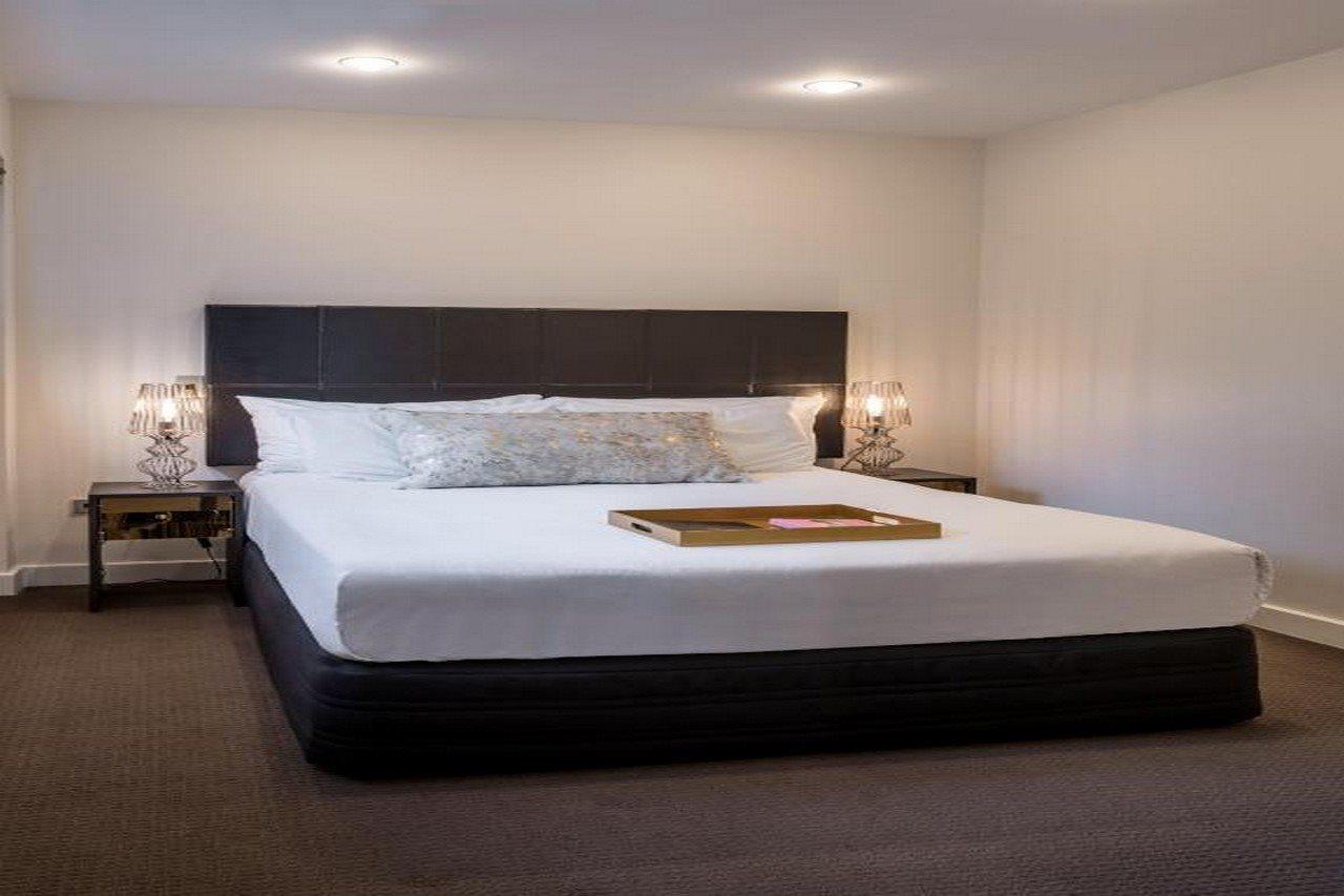 คิวที เวลลิงตัน อพาร์ตเมนต์ Hotel ภายนอก รูปภาพ A bedroom at the hotel
