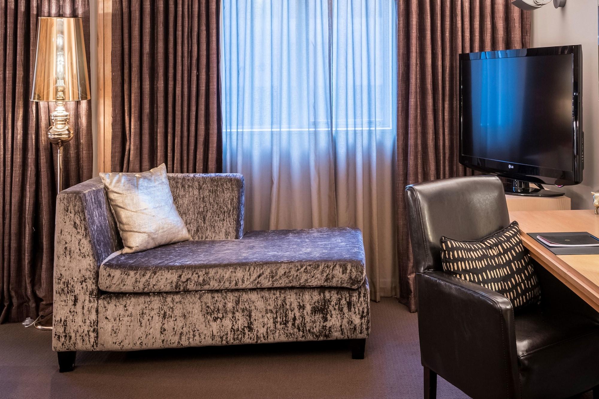 คิวที เวลลิงตัน อพาร์ตเมนต์ Hotel ภายนอก รูปภาพ A chaise longue