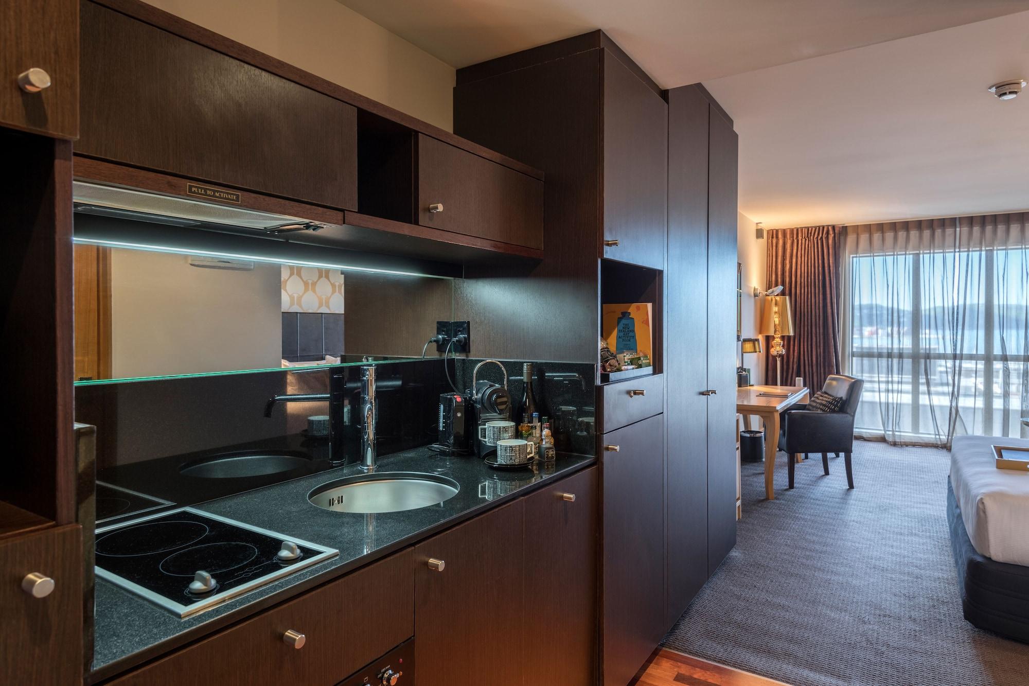 คิวที เวลลิงตัน อพาร์ตเมนต์ Hotel ภายนอก รูปภาพ Kitchenette in a serviced apartment