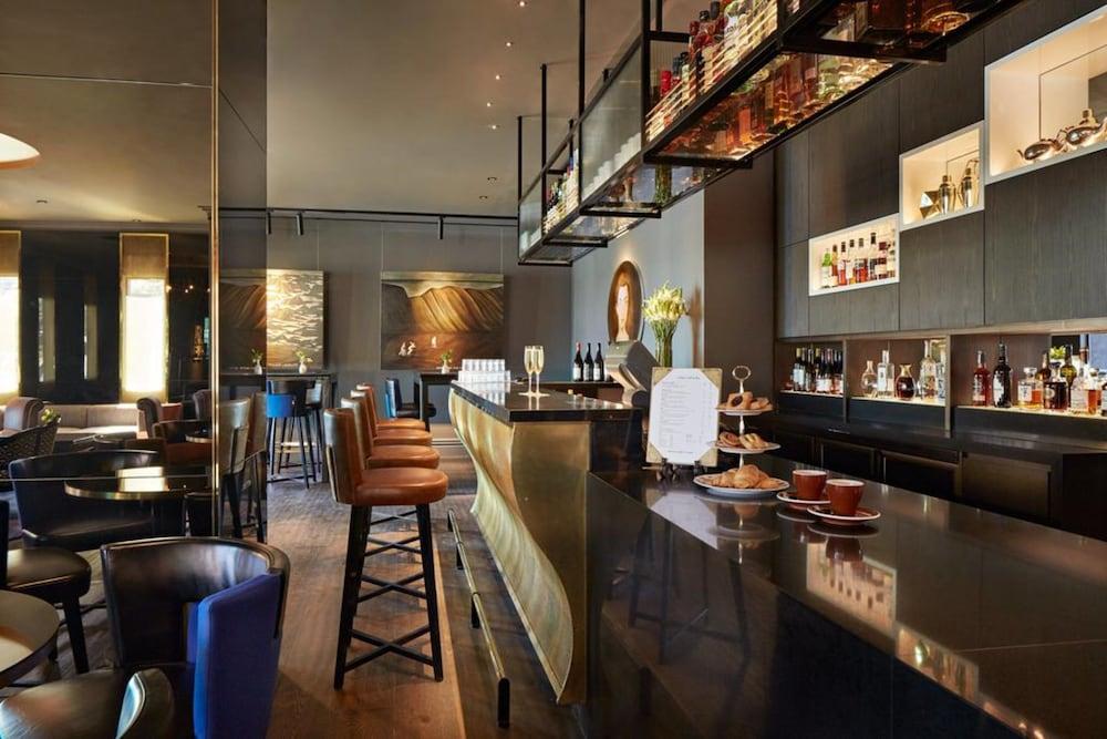 คิวที เวลลิงตัน อพาร์ตเมนต์ Hotel ภายนอก รูปภาพ The bar at the hotel